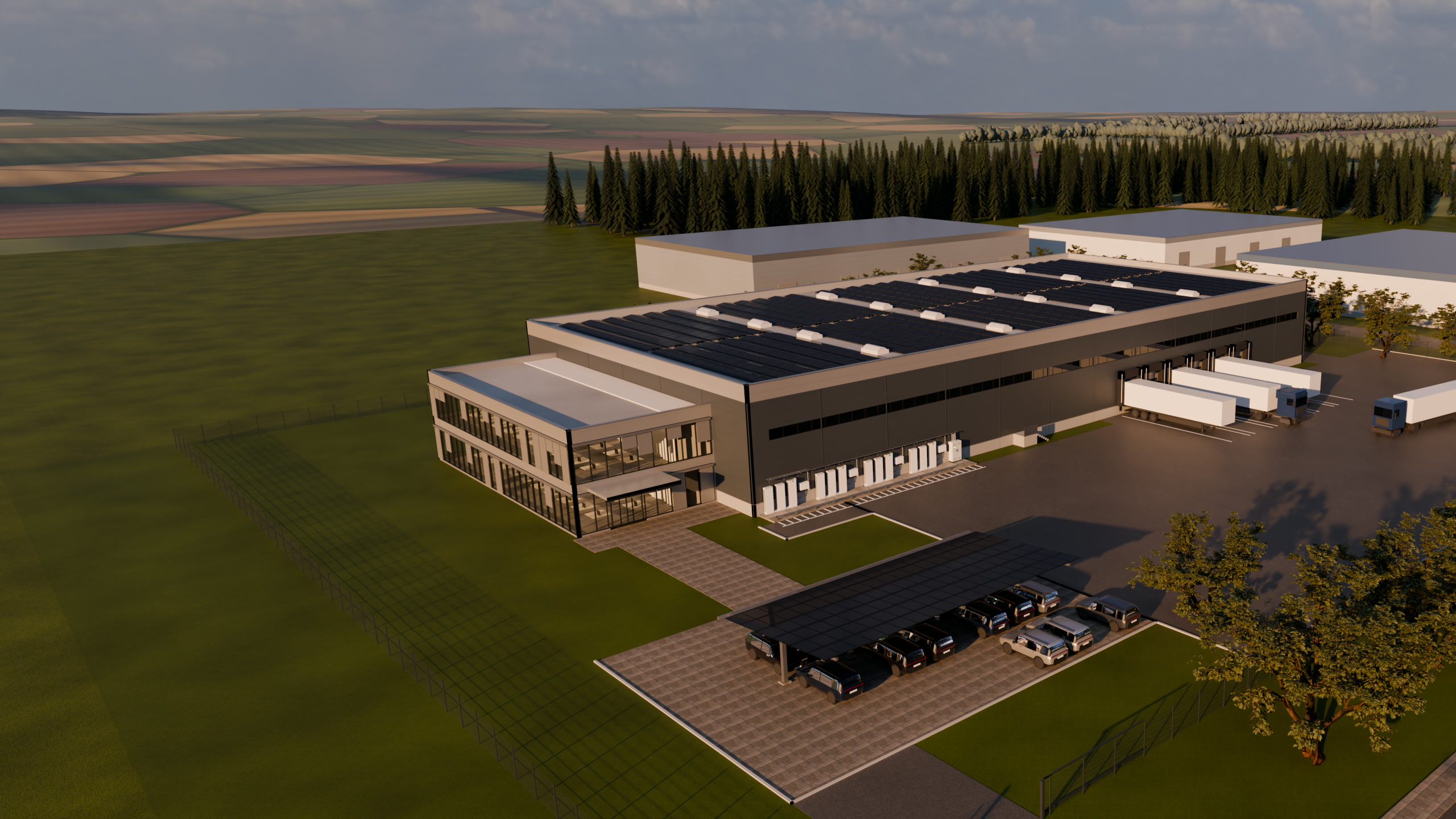Logistikhalle in der Abendsonne, das ganze Dach mit Solarmodulen belegt, davor Bürotrakt und Solarcarport